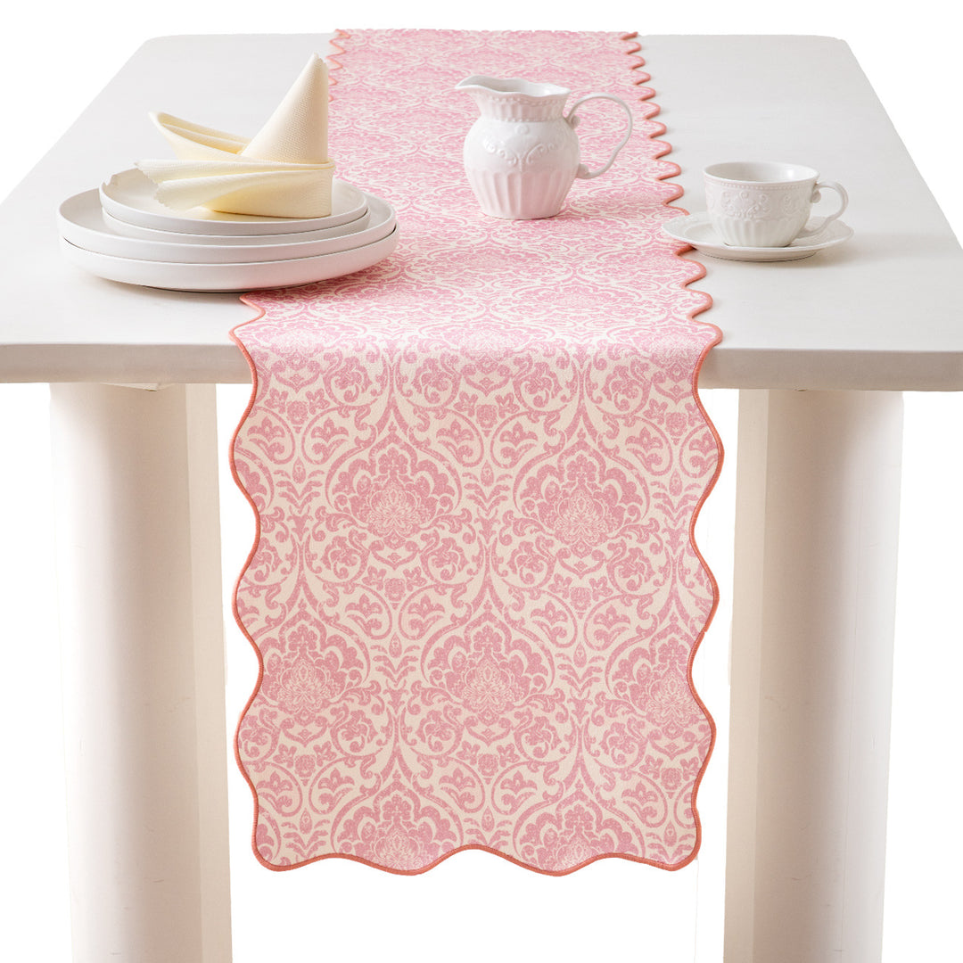 Damask-style table runner with curved wave edge and fine ornamental print Kalsten
