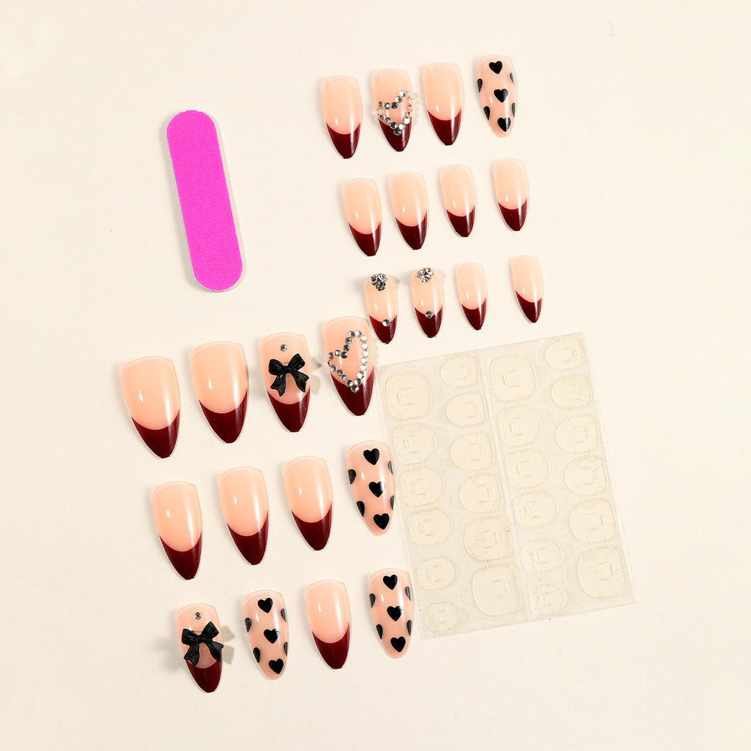 Artistic Stiletto Nail Art Extensions with Heart and Bow Accents Kalsten