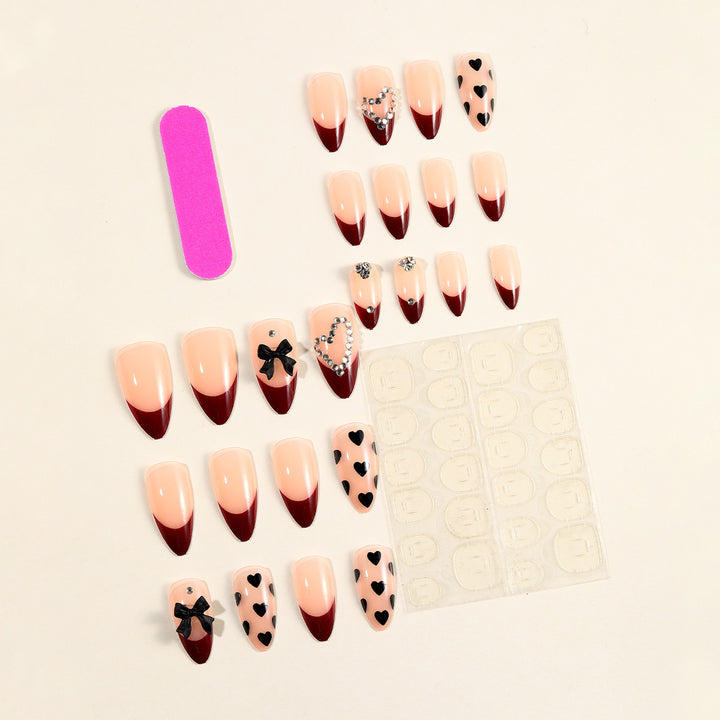 Artistic Stiletto Nail Art Extensions with Heart and Bow Accents Kalsten