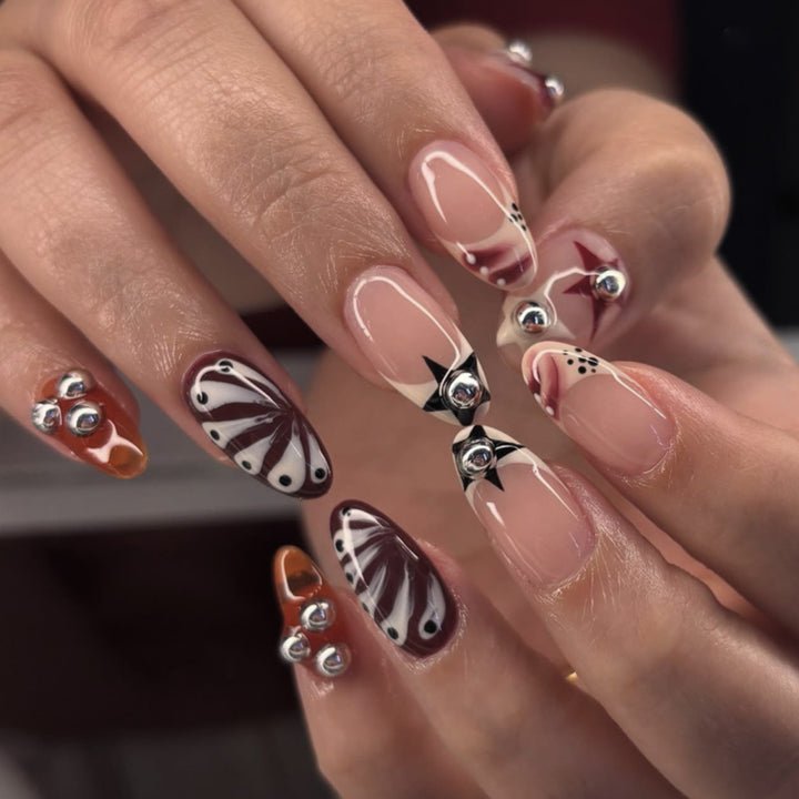 Artistic acrylic nails with creative 3D decorations Kalsten