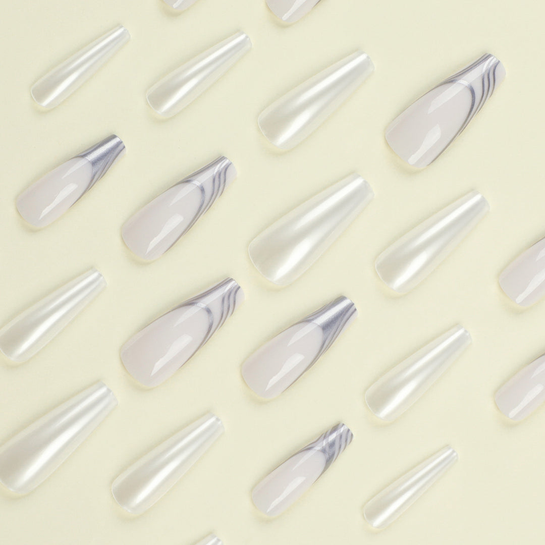 Artificial nail extensions with marbled design Kalsten