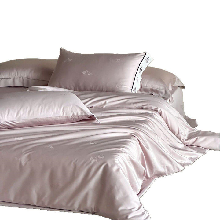 Luxurious cotton satin bedding set with embroidered hem and fine piping