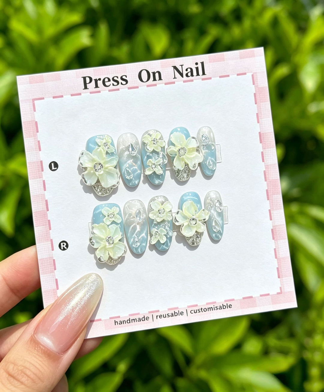 Artistic Press-On Nail Art Set with Cute Character and Bow Accents
