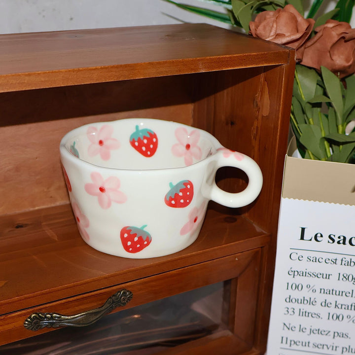 Ceramic mug with hand-painted penguin pattern