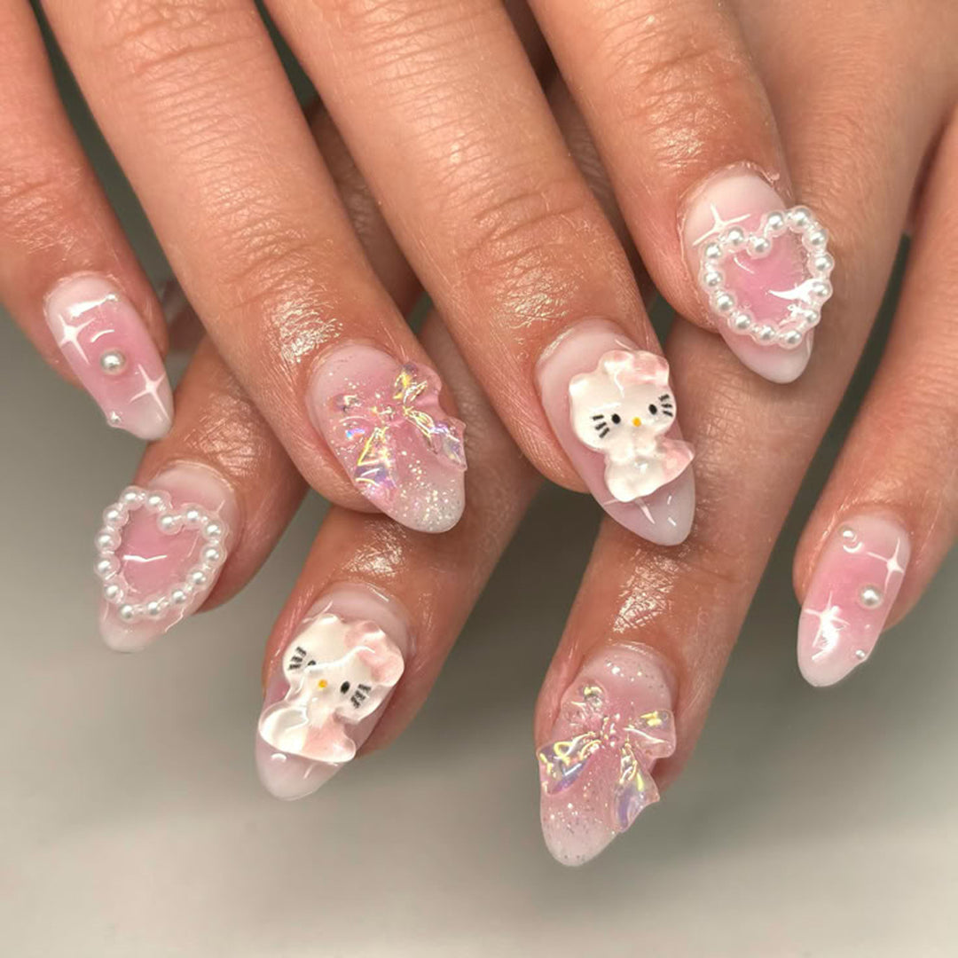Artificial nail art with playful designs and 3D elements Kalsten