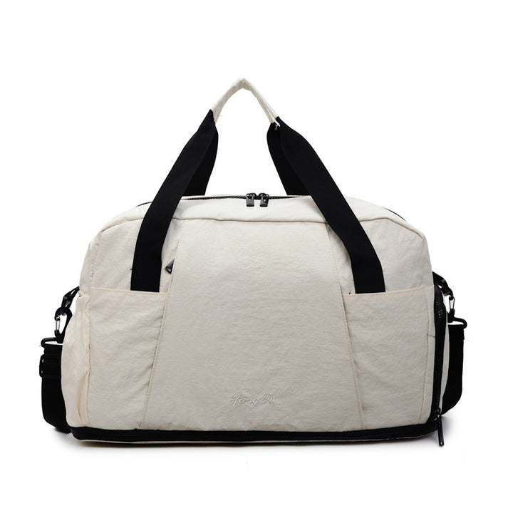 Sporty travel bag with practical outer pockets Kalsten