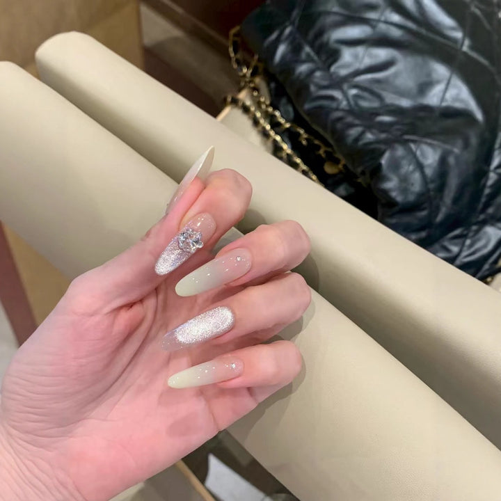 Glamorous Long Stiletto Nail Extensions with Rhinestone Accents