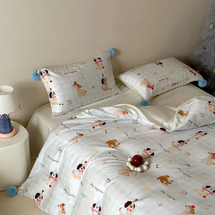 Children's bedding set with cute bunny print, pom-pom corners, and soft cotton satin