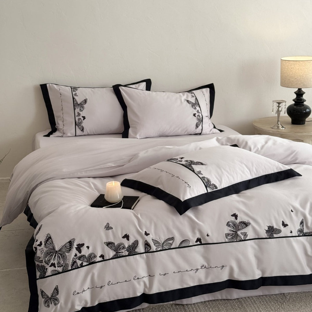 Bedding set with butterfly embroidery and contrast piping