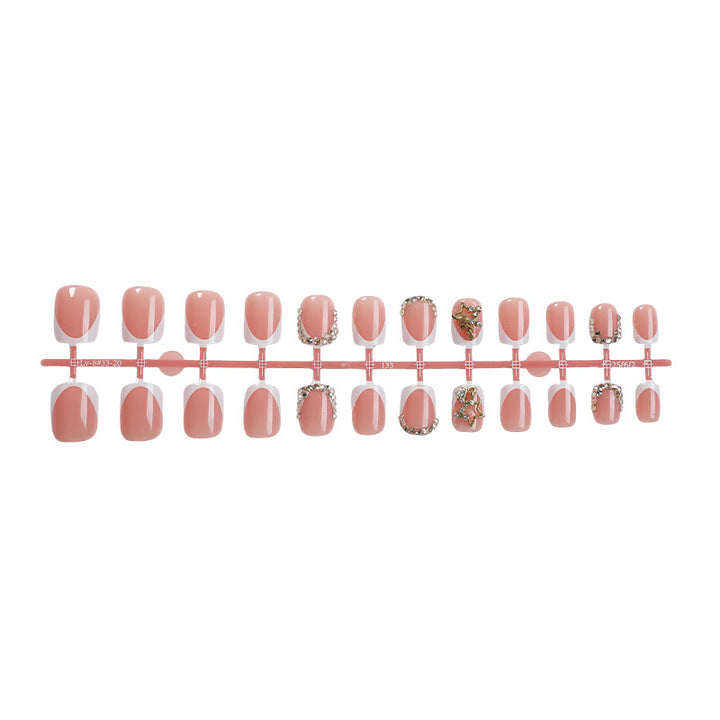 Artificial nail set with elegant flower design and glitter accents Kalsten