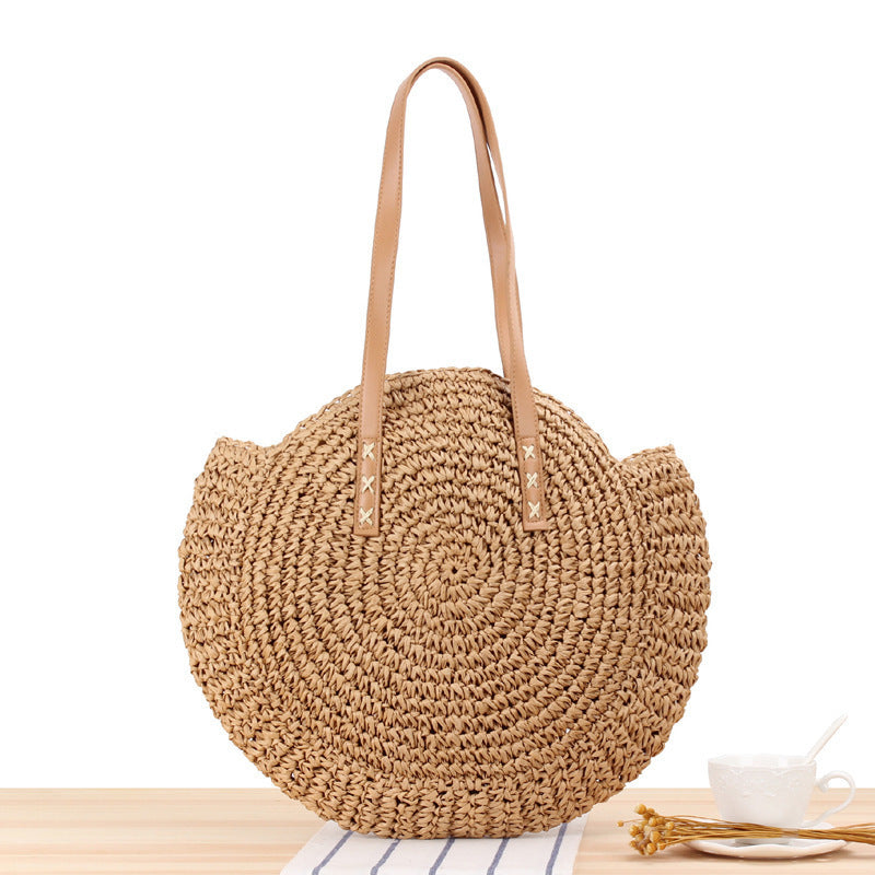 Round straw bag with leather handles Kalsten