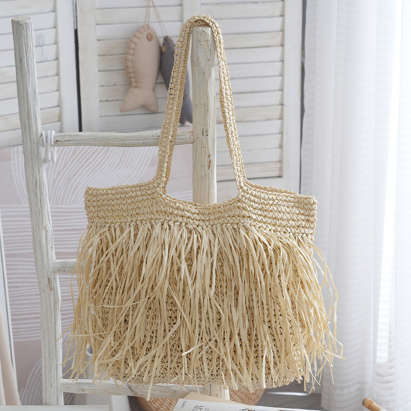 Trendy raffia bag with fringed details Kalsten