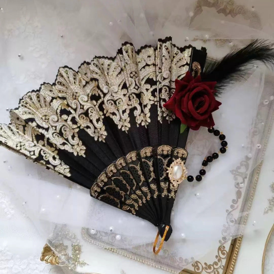 Ladies' elegant hand fan with intricate decorations Kalsten