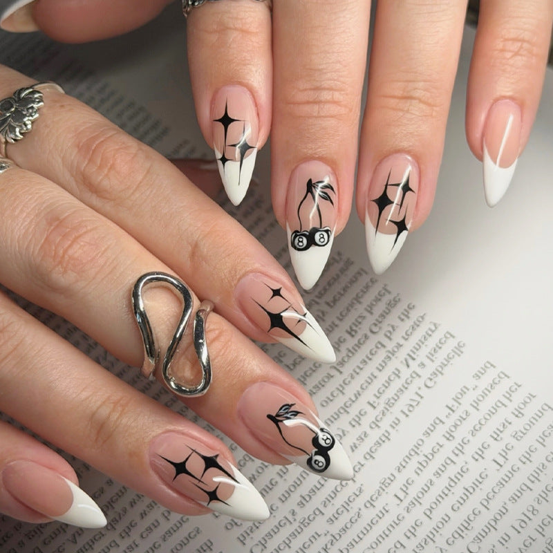 Creative nail art set with hand-drawn designs and French tips Kalsten