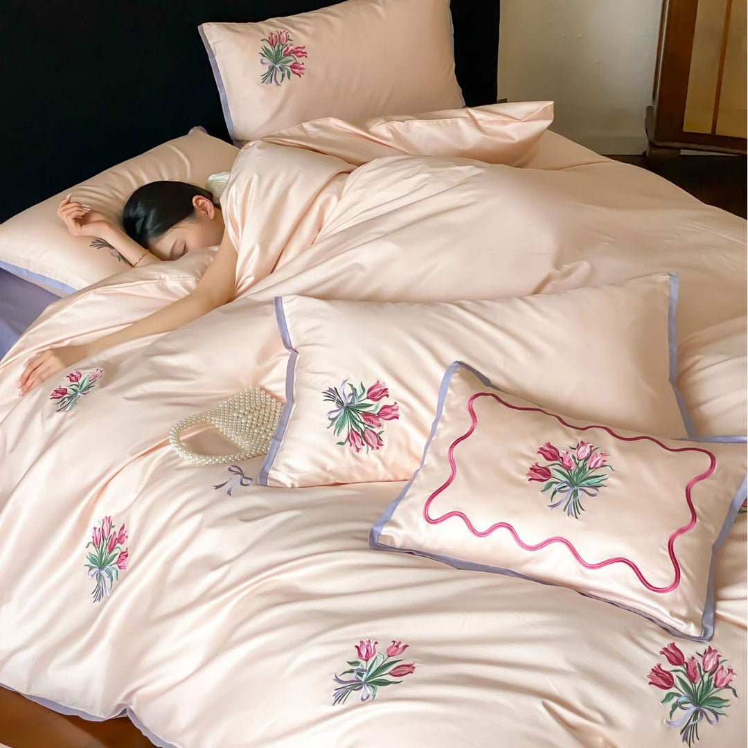 Fine cotton satin bedding set with embroidered tulip bouquets and contrasting piping