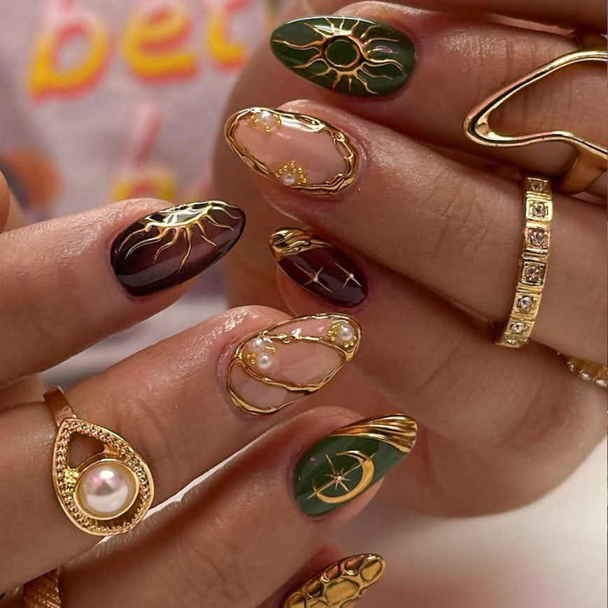 Artistic Gold-Embellished Nail Art