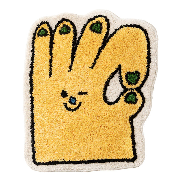 Shaped bath mat in hand shape with tufted chenille texture and non-slip underside