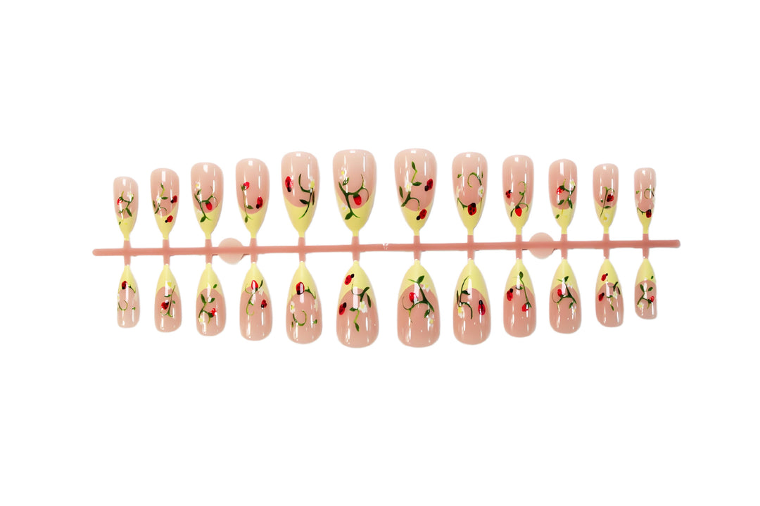 Artificial nail set with elegant gradient and floral accents Kalsten