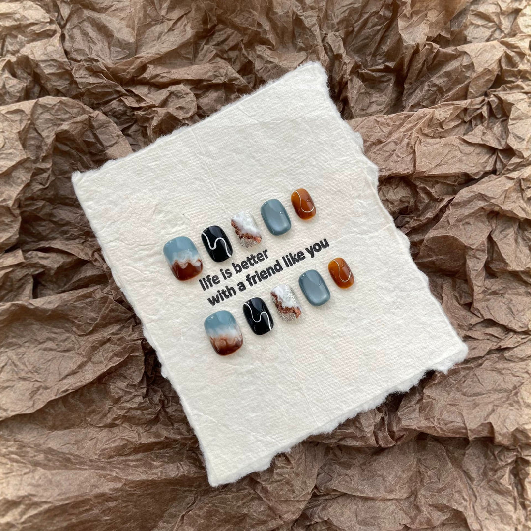 Artistic Press-On Nail Set with Stunning Marble Effect