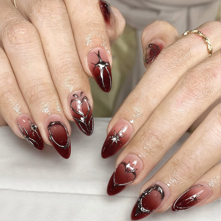 Artificial nail set with elegant glitter accents and floral details Kalsten