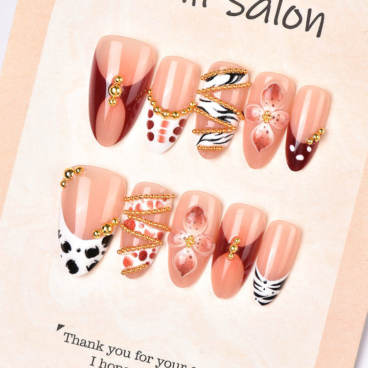 Artistic Press-On Nail Set with Floral and Gemstone Accents