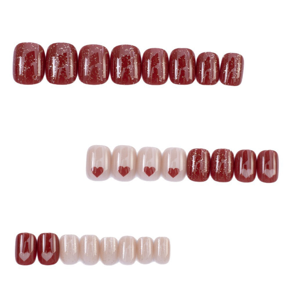 Art nail set with heart designs and glitter Kalsten