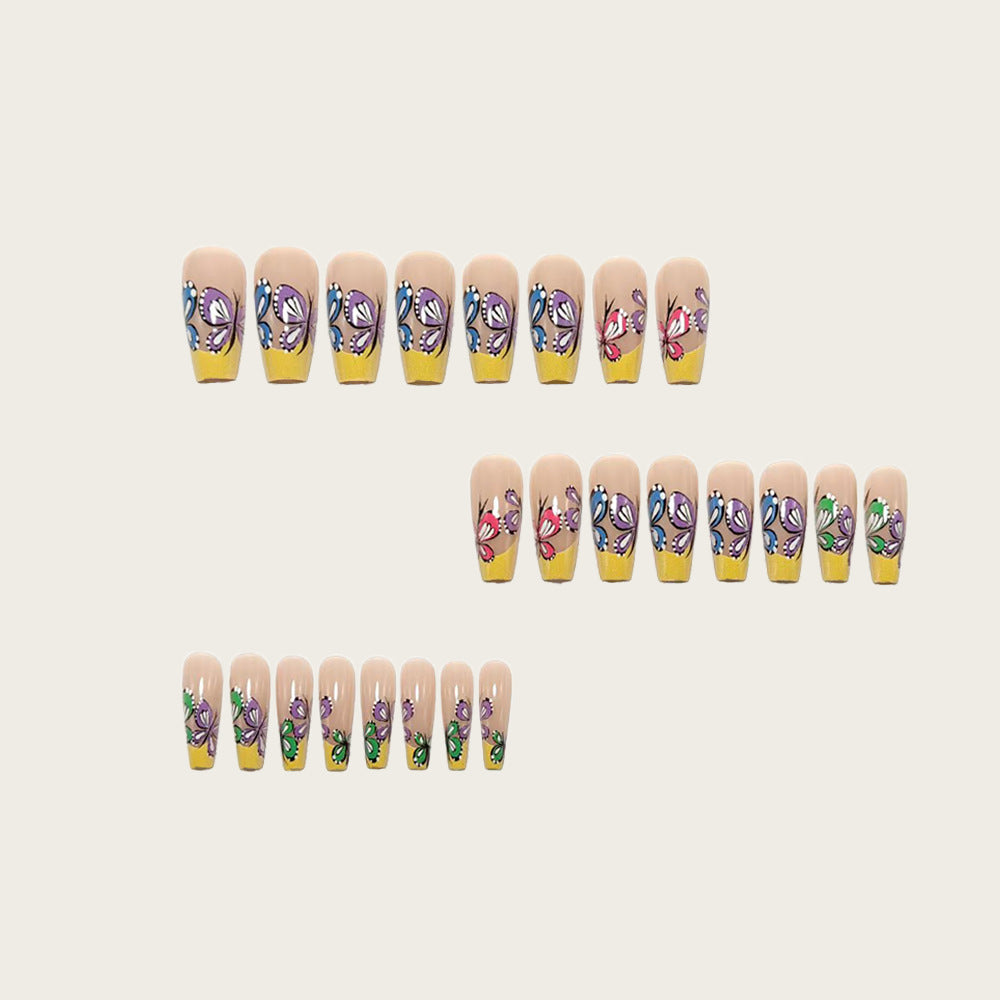 Nail set with intricate butterfly design Kalsten