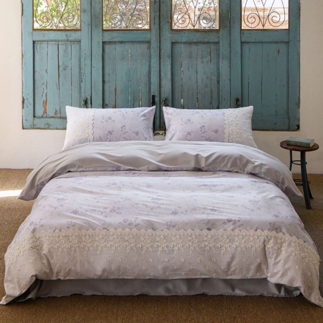 Luxurious cotton satin bedding set with floral all-over pattern, delicate lace and reversible feature
