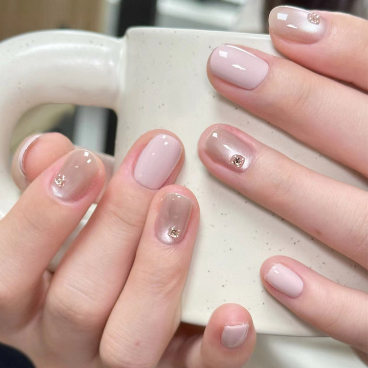 Elegant Press-On Nail Design with Rhinestone Accents Kalsten