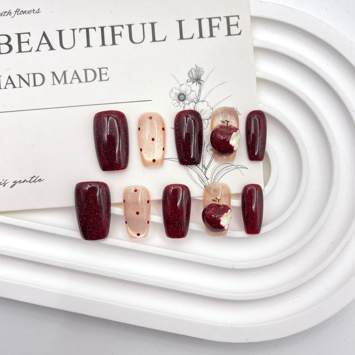 Artistic Press-On Nail Art Set with Creative Apple and Polka Dot Designs