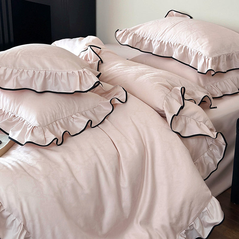 Luxurious cotton satin bedding set with ruffles and contrasting piping