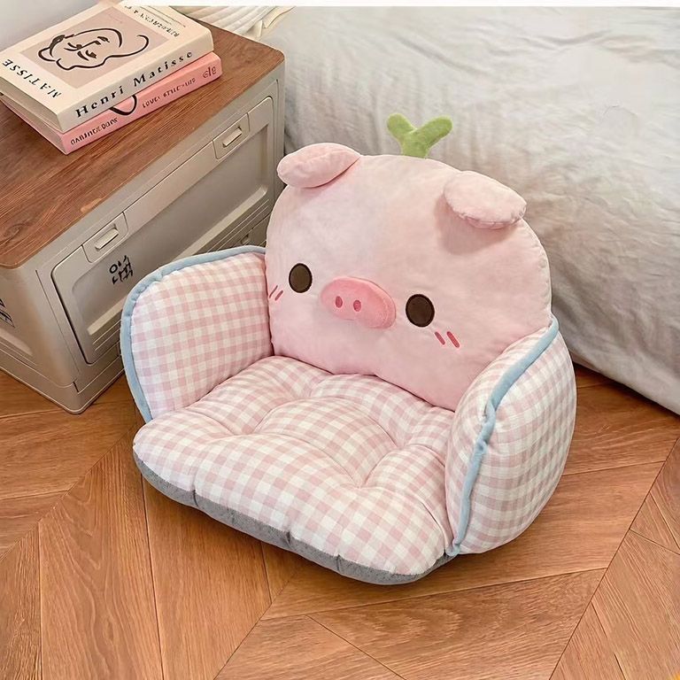 Padded plush floor seat cushion with high backrest and armrests in pig design