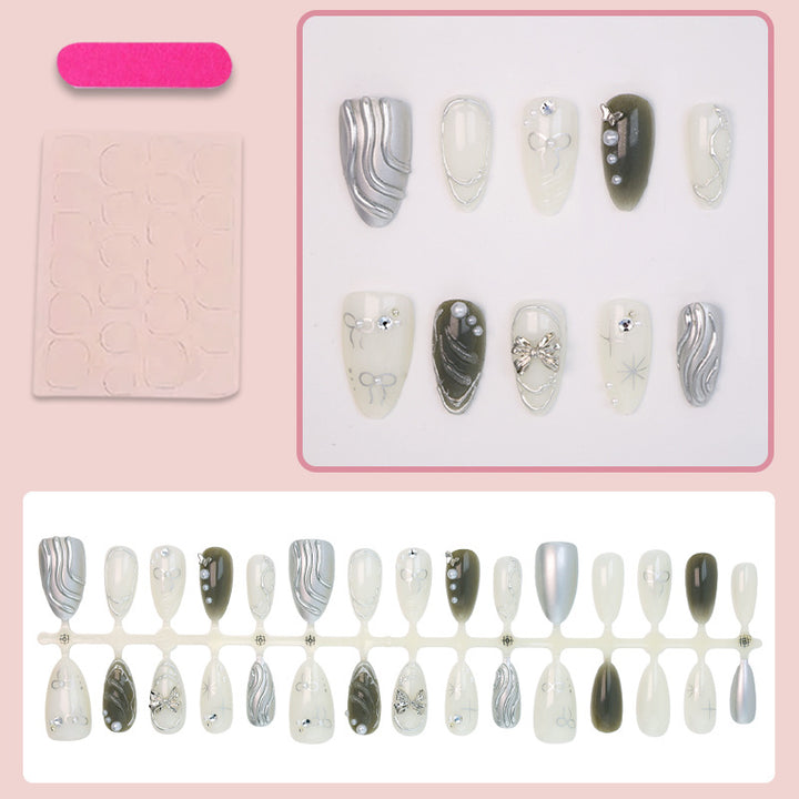 Nail set with luxurious 3D decorations and elegant stone accents Kalsten