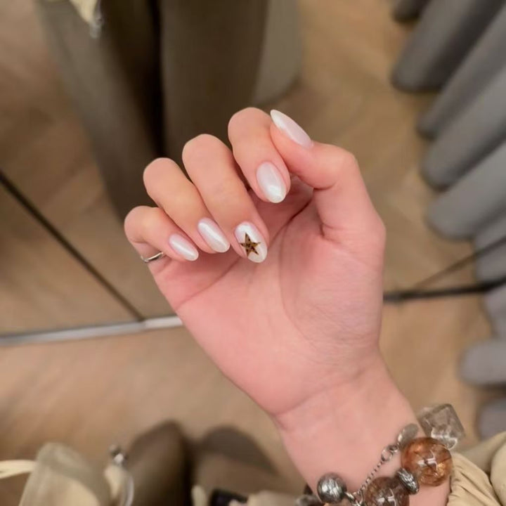 Elegant Nail Art Extensions with Star Accents