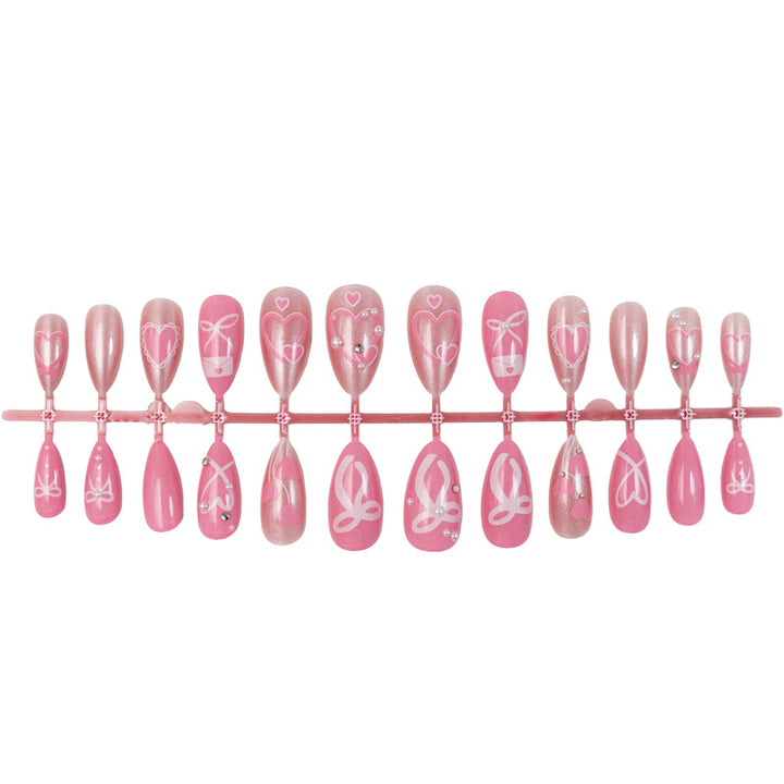 Premium artificial nail set with romantic heart and bow designs Kalsten