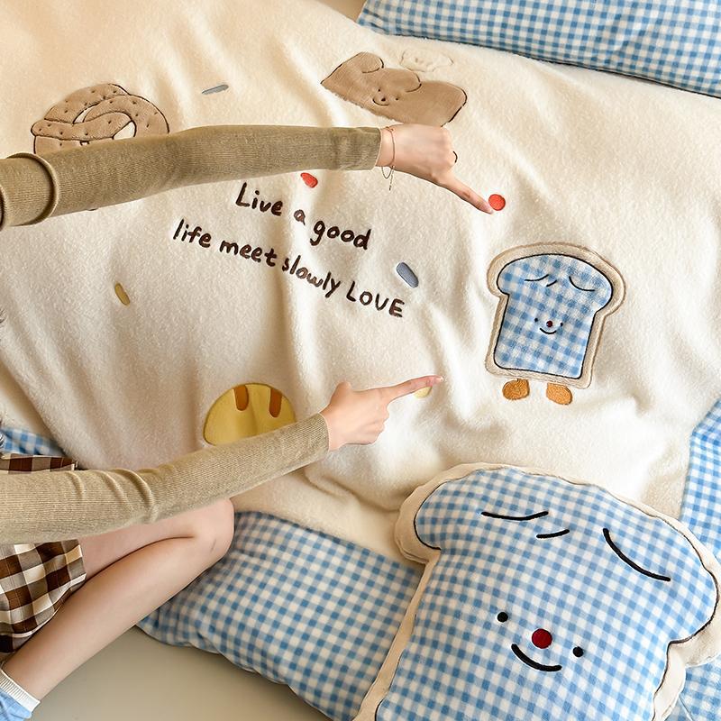 Children's bedding set with quilted cozy blanket, plush decorative pillow, and vichy check trim