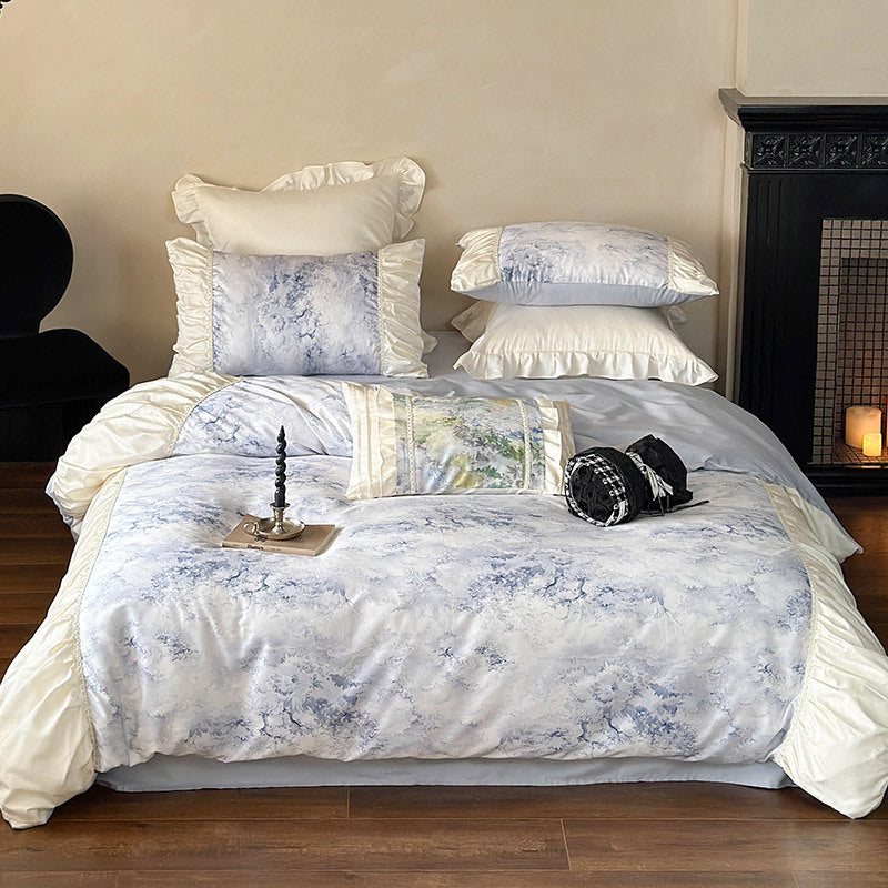 Luxurious satin bedding set with ruffles and watercolor floral pattern