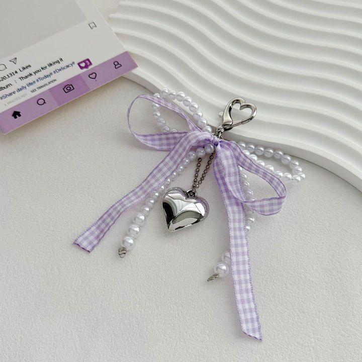 Heart-Shaped Charm Keychain with Pearls and Bow Kalsten