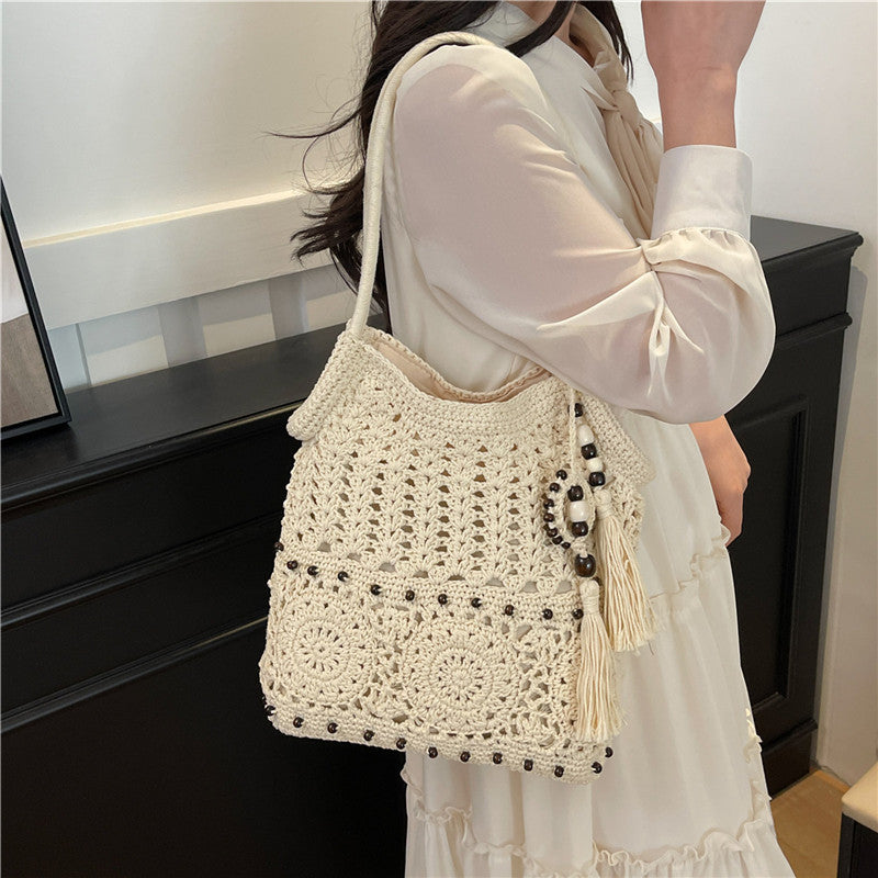 Hand-knotted shoulder bag with playful fringe design Kalsten