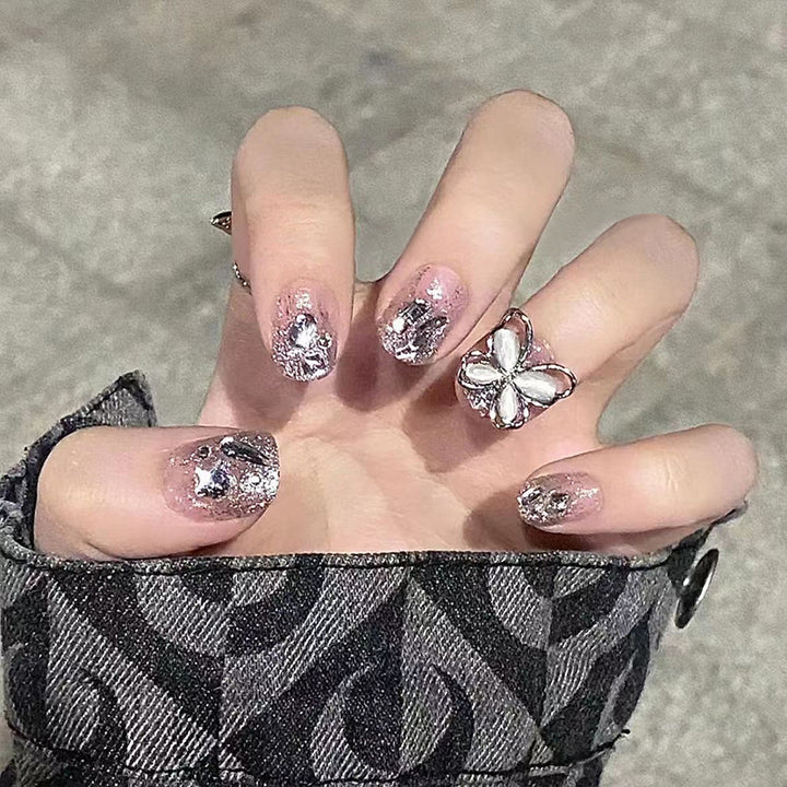 Nail art set with sparkling rhinestones and glitter elements Kalsten
