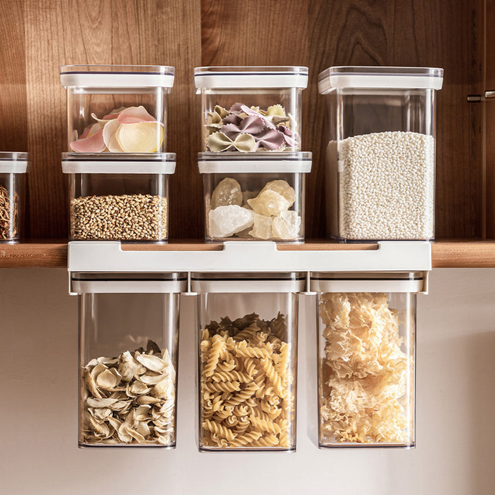Three-fold storage container with removable inserts and pouring lid