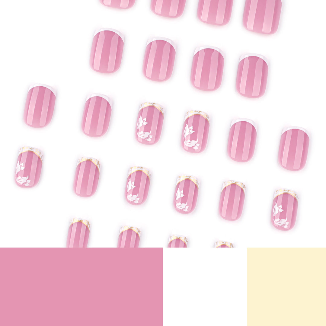 Artful nail art with elegant French tip and floral accents Kalsten