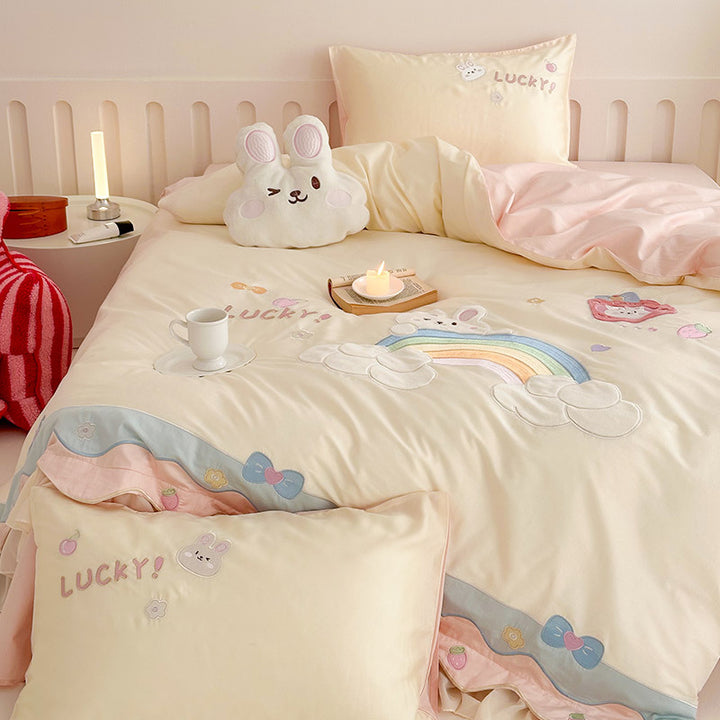 Playful cotton bedding set with appliqués and ruffles