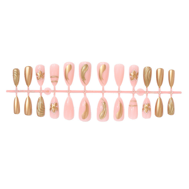 Creative nail art set with luxurious gold embellishments Kalsten