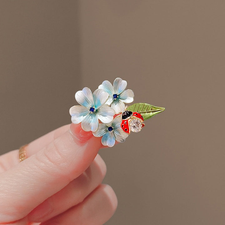 Flower brooch with ladybug and crystal Kalsten