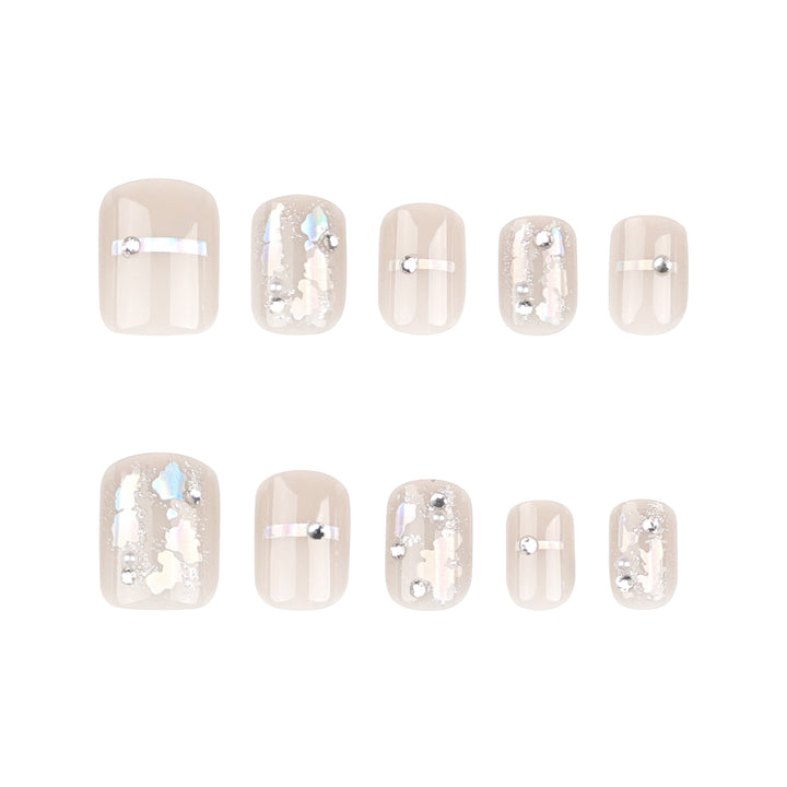 Artful Nail Art with Glitter Accents and Elegant Details Kalsten
