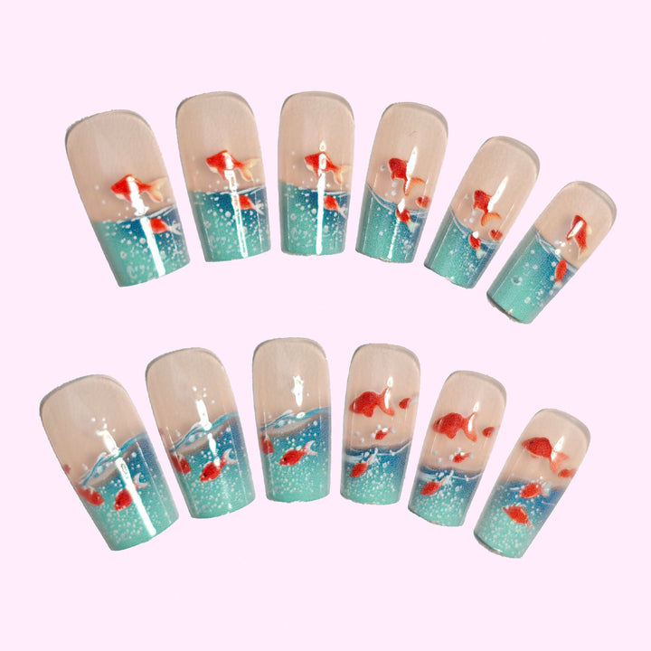 Artifical nails with maritime goldfish design Kalsten