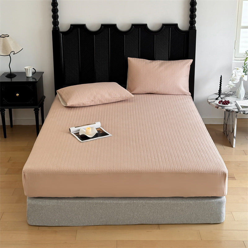 Comfort mattress topper with textured waffle surface and deep edge