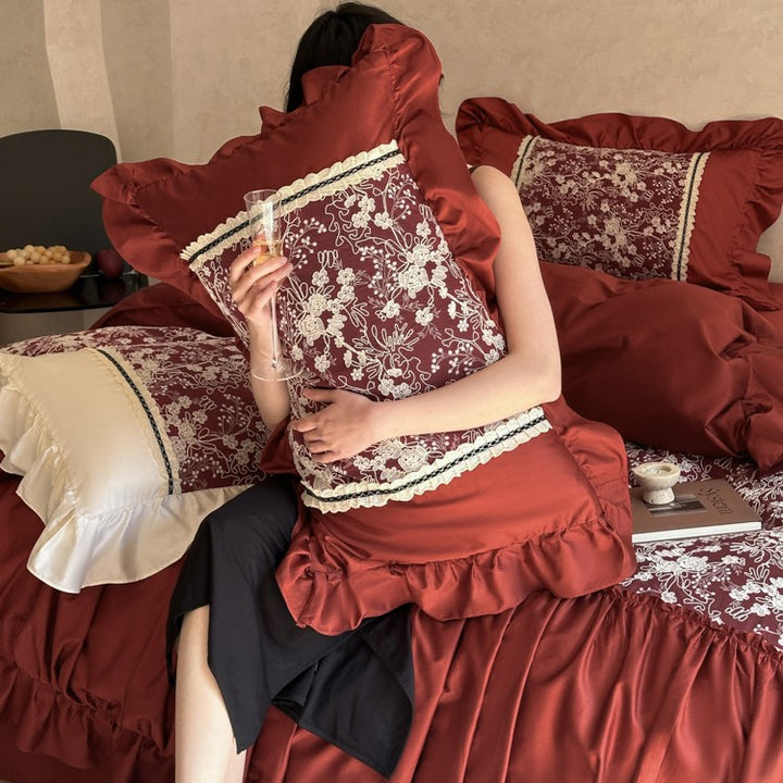 Romantic bedding set with gathered ruffle, jacquard centerpiece and decorative bedskirt