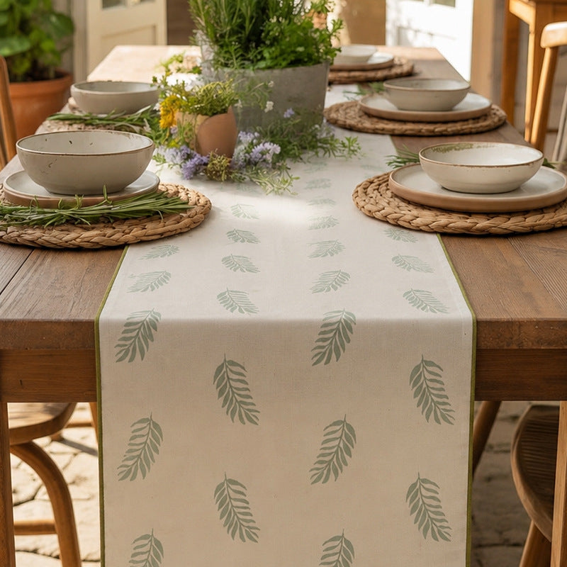 Woven table runner and placemat set made of cotton-linen with botanical scrolling pattern